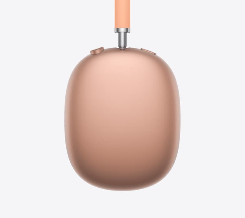 AirPods Max 2 headphones, side exterior, orange color, detail of telescoping arm, ear cushion, Digital Crown and noise control button