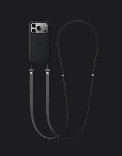 iPhone 17 Pro, back exterior, silver finish, with black Silicone Case with MagSafe and dark gray Crossbody Strap attached