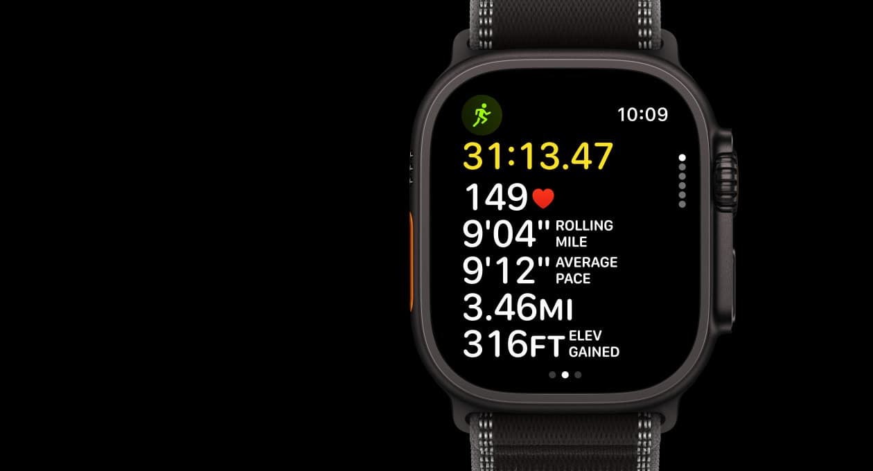 Apple Watch Ultra 3, black color, titanium case, Workout app, Outdoor Run, left side exterior, Action button, right side exterior, Digital Crown, side button, band, Trail Loop, black/charcoal color